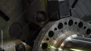 Close Up. Heavy Industry Automated Rotating Turbine Machine For Electrical Power Generation. Mechanic Industry Turbine Shaft Spinning Heavy Gear. Heavy Industry Turbine Production Factory. Engineering
