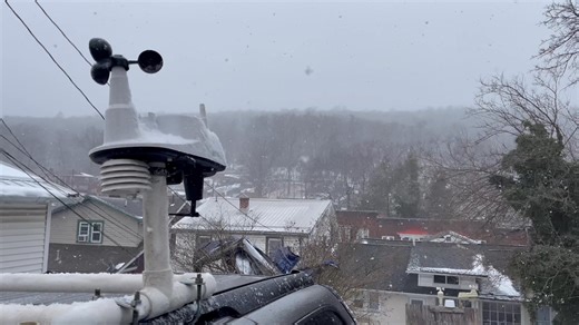 Snow in west-side Cumberland, MD at 10:24 AM (1-19-25). Temperature is around 31.6 degrees with breezy winds. Stay Tuned! | WeatherFix.net