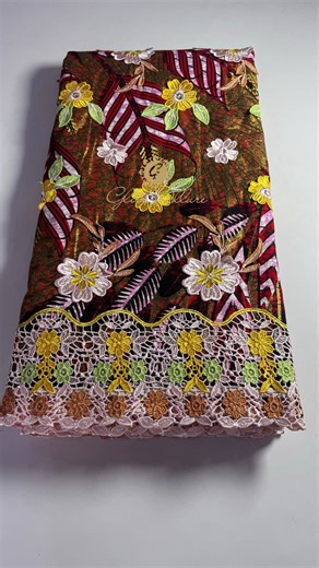 Glitz Allure Fabrics on Instagram: "❌SOLD OUT❌ It has come to our attention that the new designs in Ankara has evolved and they did not come quietly.😍 Introducing a striking union of bold Ankara prints fused with intricate chord lace, where tradition dances with luxury. Bask in the rich flowery embroidery and bold colors, crowned with a scalloped chord finish that demands nothing less than admiration. This is not fabric for the faint-hearted, it is for women who enter rooms and change the tempe