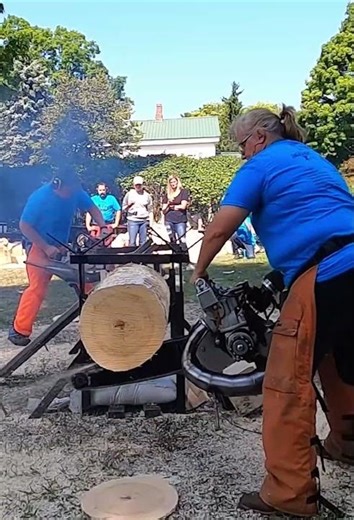 Intense competition process of cutting wood with a chainsaw