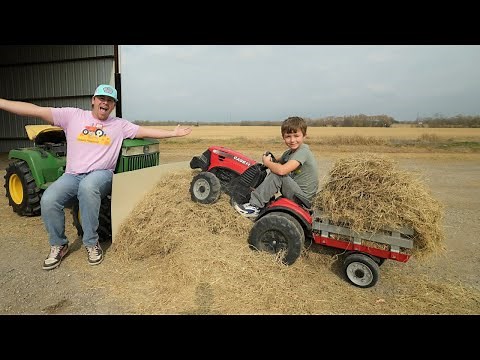 Playing with tractors moving hay and rocks | Tractors for kids