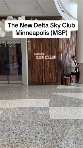 Welcome to the new Delta Sky Club in Minneapolis Airport! This luxurious lounge offers a variety of amenities to enhance your travel experience. From comfortable seating and complimentary Wi-Fi to a bar area and healthy snacks, this Delta Sky Club has everything you need to relax and recharge before your flight. Take advantage of the premium bar with top-shelf liquor options or grab a bite to eat from the freshly prepared food offerings. Work efficiently with complimentary printer and fax servic