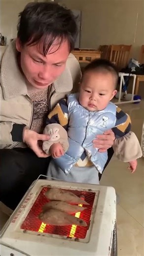 The son wants to touch everything he sees, so his father teaches him a lesson