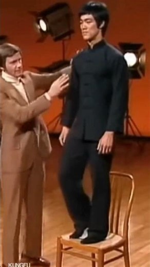 Bruce Lee. Perfect balance. One chair. Impossible high kick. 🪑⚡