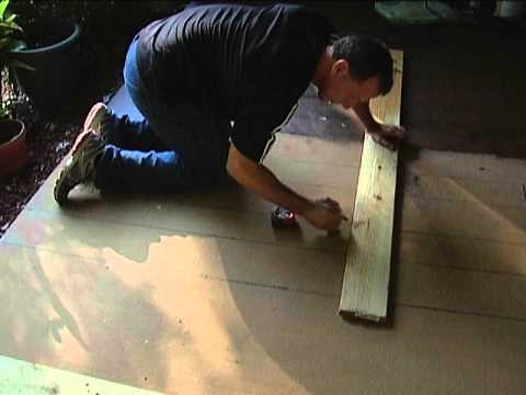 Stain concrete porch to look like wood. EASY!