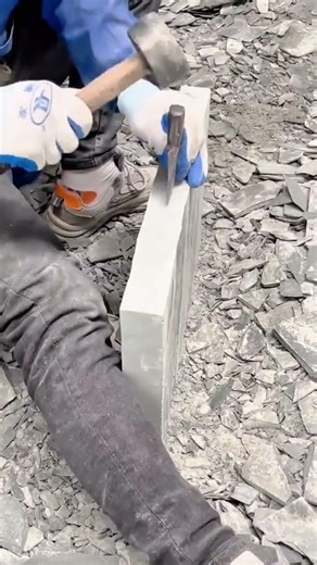 Splitting a Large Stone Slab Into Two Even Pieces Using a Hammer and Chisel Professionally