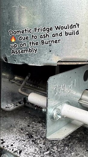 Dometic fridge wouldn’t ignite due to ash and char on the burner assembly. #rv #camping #repairs