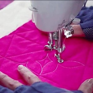 Conquer Free-motion quilting with structured free motion! Quilt with a grid with your walking foot, then fill it in with free-motion quilting designs. Learn the secrets to this captivating technique in this NEW Craftsy class! | Craftsy