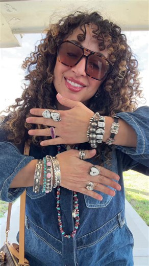 Friday fit 🔥! Love this Levi’s coverall I got from @Alejandra Mars it’s so good! The jewels are white buffalo and purple spiny!😍 WB Lariat is from @Texanna Belles Jewelry Choker is from @Frankie Jo’s Purple spiny long chip necklace - @Silver Cactus Co WB cluster earrings, 2 stone ring, 5 stone cuff, heart ring pink conch bangle from @The Pink Cattle Co Use code - Patsy for $ off!! Purple spiny ring, leather and concho bracelet and silver bangle from @River Turquoise small white WB ring from @B