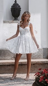 7.6K views · 44 reactions | Keeping it short and sweet! Introducing the #Lyra from @abellabride - a beauty blooming with floral lace and twinkling tulle, epitomizing the classic bridal silhouette. Drop a 懶 if you’re swooning too! | Allure Bridals | Facebook