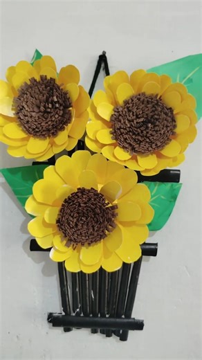 "Turning paper into sunshine! 🌻 Hand-made sunflower wall hanging." PaperCraft #DIY #SunflowerCraft #