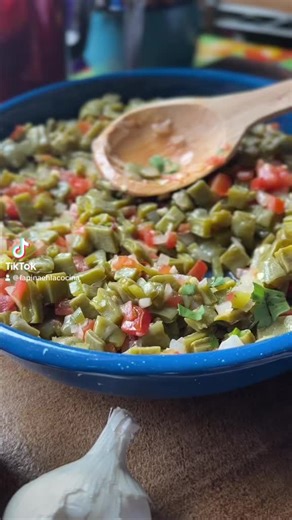 Nopalitos!! Nopalitos a La Mexicana! Prepared this easy and delicious dish this afternoon. Leaving the instructions on how I cook the feesh Nopalitos. Get more complete step by step printable recipe for Nopales on my blog pinaenlacocina.com COOK NOPALES- Slice 2 pounds clean nopales to desired size. Transfer to a skillet. Season with 1/2 tsp of salt. Add 1 sliced serrano pepper, 1/4 small white onion, 2 cloves of garlic and a handful of fresh cilantro. Cover skillet and heat to right below mediu