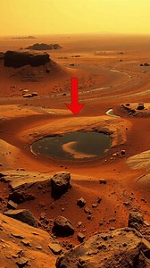 • Did Mars Once Flow with Water? This stunning Martian landscape shows what scientists believe to be ancient riverbeds and dried lakes - strong evidence that liquid water once existed on the surface of Mars. The curved valleys and smooth basins suggest erosion caused by flowing water, possibly from ancient rainfall or underground springs billions of years ago. Rock formations and sediment layers in these regions are still studied by rovers like Perseverance to search for signs of past microbial 