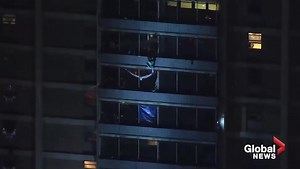 Man climbs 13 stories as fire burns inside Philadelphia apartment building