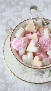 🩷💐 HELLO, SUGAR! 💐🩷 Okay, so these aren’t my usual cookies, but I couldn’t resist sharing this project tutorial from my YouTube archives. It is super simple yet lends the perfect touch of sweetness to any Valentine’s Day table. I mean, who wouldn’t ooh and ahh over rose- and heart-shaped sugar cubes?! Basically, all you need to do is mix granulated sugar and tinted water in the ratio of 1 cup to 1 tablespoon, pack the moistened sugar into molds, invert the molds to release the sugar, and the