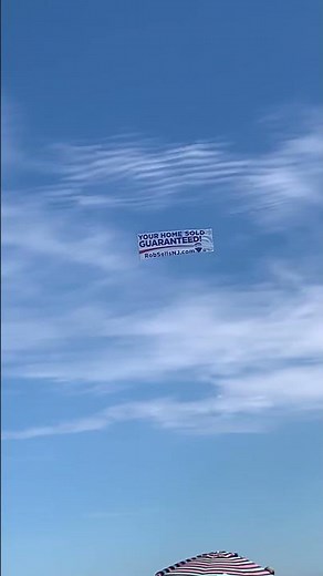 Piper J-3 Cub towing a banner 9/4/2021