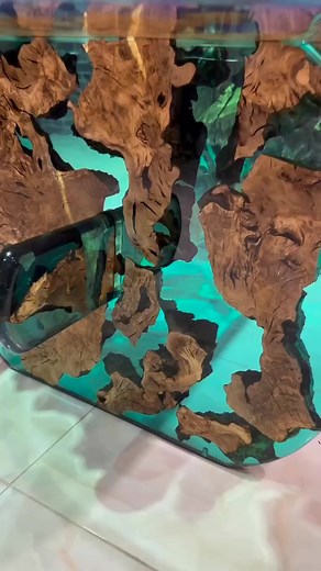 🌿 *Semi-Transparent Epoxy & Olive Root Table – A Natural Masterpiece* 🌿 Experience the beauty of *olive root wood*, enhanced with *semi-transparent epoxy*, creating a stunning fusion of nature and craftsmanship. This unique table is designed to bring warmth and elegance to any space. 📏 *Customizable Options:* Choose your preferred *dimensions* and *epoxy color* to match your style. Transform your space with a one-of-a-kind creation—contact us today! #epoxytable #woodtable #diningtable #resina