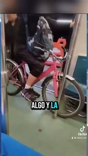 Man boards subway with his bike and blocks passage