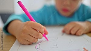 Young Boy Learning To Read And Write Uses Pink Marker For Dot-To-Dot Letter Formation