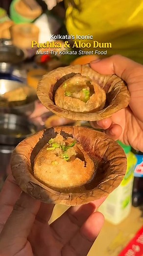 Foodie Moodie on Instagram: "Kolkata’s Iconic Puchka & Aloo Dum 💕 In Kolkata, phuchka or puchka exists in a class of its own. The Kolkata phuchkas are large shells filled with a blend of spice and mashed potatoes and a tamarind water, chillies and even a dash of gondhoraj lemon. 🍋 How many can you eat at once? 😋 ———- 🏷 SAVE this post & TAG your friends & don’t forget to SHARE with your friends & family! __________________________________________ #kolkatafood #streetfood #puchka #kolkata #kol