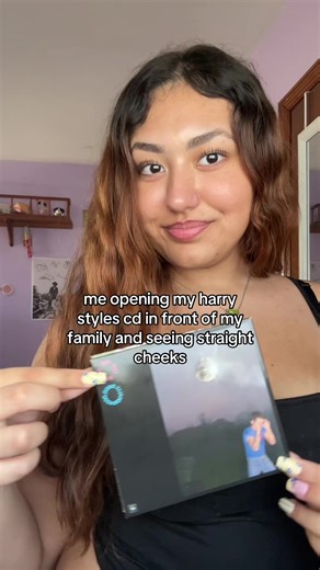 Opening My Harry Styles CD: A Family Moment