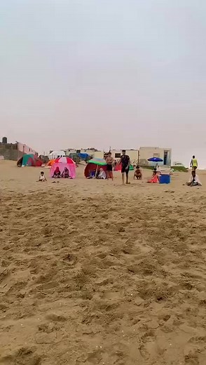 Acrobatic Beach Performances Featuring a Young Male