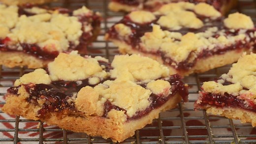 6.4K views · 210 reactions | Link to recipe: https://www.joyofbaking.com/shortbreads/RaspberryShortbreadBars.html For this recipe we are making delicious Raspberry Shortbread Bars. Just think, two buttery layers of sweet shortbread sandwiched together with a tart and tangy raspberry jam. A match made in heaven. Let's get baking!! | Joyofbaking.com | Facebook