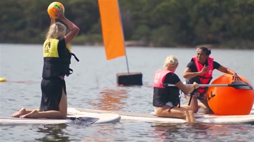 The group play a game of SUPBALL