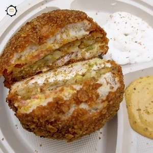 51K views · 332 reactions | These cornflakes encrusted Crunchy Burger from Wong’s Kitchen in Rohini, Delhi is quite a sensation amongst the young crowd. The playful crust combined with the crispy potato patty and vegetable-mayonnaise salad together makes it an irresistible treat. Have you tried it? | Delhi Food Walks | Facebook