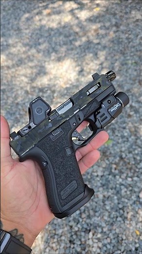 Gen 5 Glock 19 customized by Firing Squad Firearms. Trijicon RMRhd, stippling, Overwatch Tac trigger