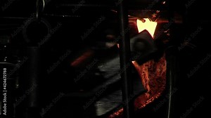 A Very Large Marble Making Machine Dropping Globules of Molten Glass at a Traditional Marble Factory in Argentina.