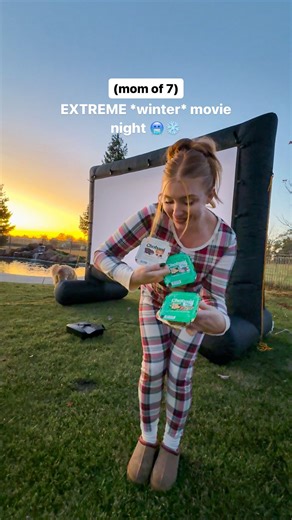 Jessica Skube on Instagram: "Between the blow up pool, the @chobani Flip® Peppermint Perfection, and the movie screen twice the size of me…. let’s get this EXTREME outdoor movie night *winter* edition… STARTED! 👏🏻 #grwm #movienight #momof7 #extreme #setup #diy"