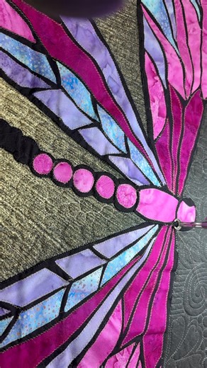 I’m loving this dragonfly quilt that belongs to D. Listen along as I stitch additional stabilization in the appliqué. Have a beautiful day!🩵 #APQS | Sheridan Kay Quilting