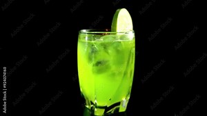 Midori Liqueur Cocktails feature the vibrant melon flavor of Midori, offering a refreshing, colorful drink that's perfect for parties, celebrations, and unique gatherings. Stock Video