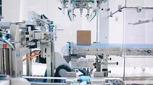 Schubert lightline Cartonpacker_ The smart case packer for erecting, filling and