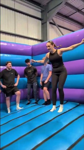 Woman Fails Front Flip at Inflatable Park and Faceplants