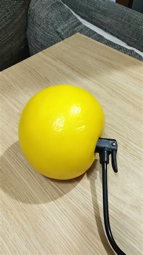 I’m making a lemon explode with a pump