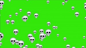 Skull face emoji isolated, dead emoticon face emoji. Animated falling emojis. Social media icons symbol animation with green screen background.