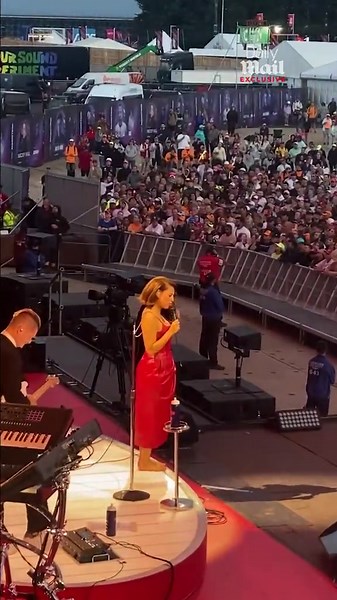 Lewis Hamilton can't keep his eyes off Raye at F1 British Grand Prix