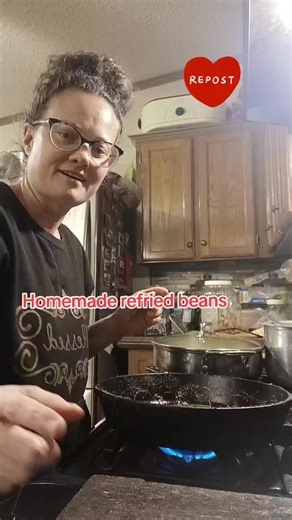 Homemade refried beans in a castiron skillet. Hopefully you have some salt, pepper, onions and garlic to season them with. Fresh or dried powder will work. I'm making rice and frybread with this. Video on how to cook the dry beans first> https://www.facebook.com/share/r/1BUbsUW9uL/ #howto #easycooking #beansandrice #budgetmeals | Rhashell Romans