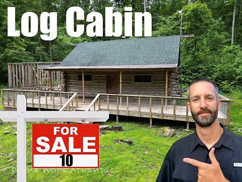 Log cabin for sale in the Ozark Mountains of Arkansas. 10 acres with a creek in the yard.