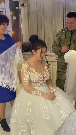 Blue Dress and Camouflage Uniform Wedding Moment