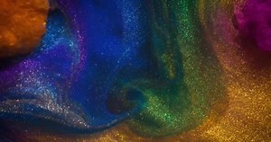 Download Colorful liquid is shown in a glass container for free