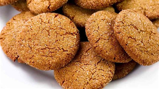 Crispy, soft-centered gingersnaps packed with warm spice, a cozy holiday classic