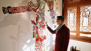 6.4K views · 31 reactions | This 3.8-meter-tall shadow puppet features a woman standing proudly in armor, holding a long spear with an imposing and heroic presence. Which character do you think she is? Here's a hint: think about those heroines throughout Chinese history. Leave your answer in the comments below. #ChinaTravel #2025ChinaAgenda #ChinaVibes #Film #FilmTourinChina #Beijing | China Plus Culture | Facebook