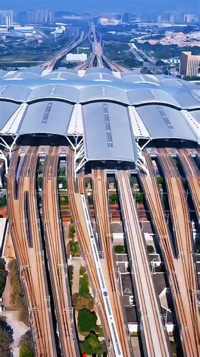 Architecture Discuss on Instagram: "Guangzhounan (Guangzhou South) railway station, located in Shibi, Panyu District, Guangzhou, Guangdong Province, China, stands as a testament to modern transportation infrastructure. Designed by TFP Farrells, this expansive station officially commenced operations in early 2010, briefly holding the title of Asia's largest railway station by area. Serving as a pivotal interchange and terminus for major rail lines such as the Guangzhou-Shenzhen-Hong Kong XRL, Gua