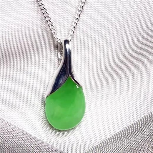 Real green jade necklace in a teardrop or pear shaped, timeless designed pendant solid chain