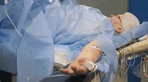 clip-1101824477-old-woman-on-operating-table-surgery-department