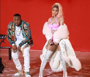 Yo Gotti And Nicki Minaj Let The Dollar Bills Fly High In “Rake It Up” (Video)