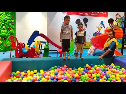 “Cute Kids Playing in Ball Pit | Fun & Laughter at Indoor Play Zone”